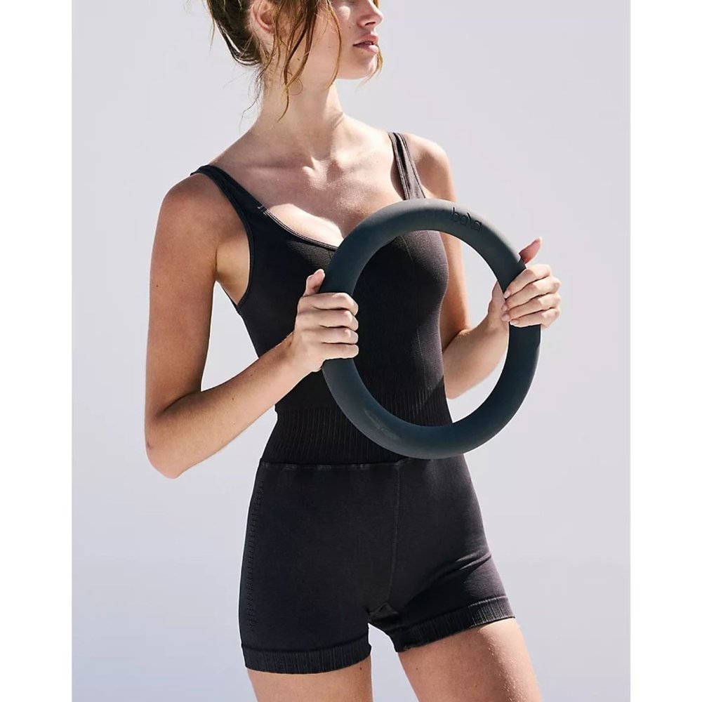 NWOT Free People Movement Good Karma Runsie in Washed Black
